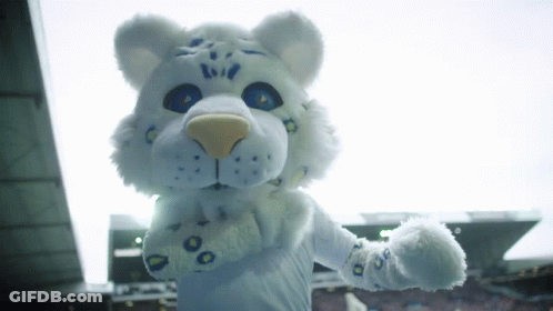 White Stuffed Animal With Blue Eyes And Spots GIF
