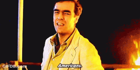 White Suit Man Talking About Americans GIF