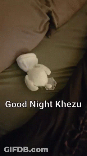 White Teddy Bear Laying On Bed Good Night Khezu GIF