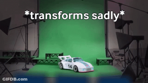 White Toy Car With Number 14 GIF