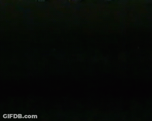 White Triangle On Yellow Background GIF