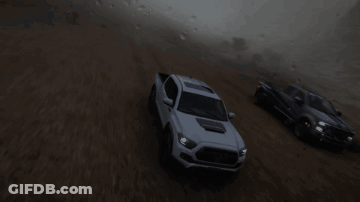 White Truck Flying Over Hill GIF