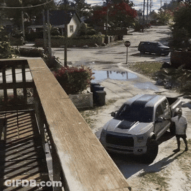 White Truck Parked On Road GIF