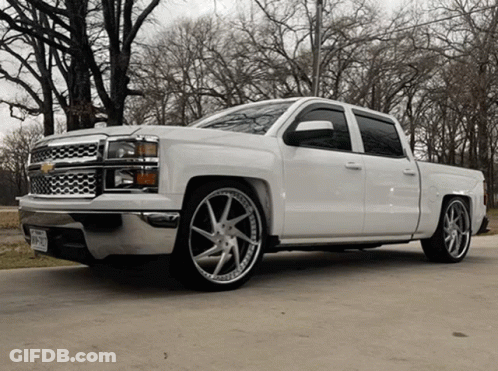 White Truck With Texas License Plate Parked GIF