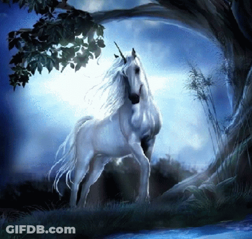 White Unicorn Standing Under Tree In Field GIF