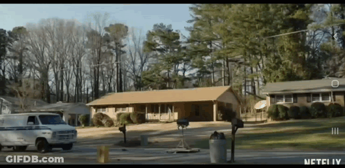 White Van Parked In Front Of House With Netflix GIF