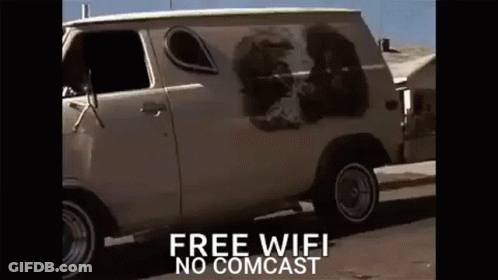 White Van With Dog Picture Parked On Road GIF