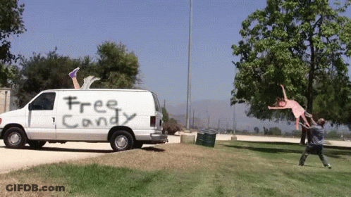 White Van With Free Candy Written On It GIF