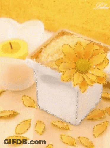 White Vase With Yellow Flower And Yellow Candle GIF