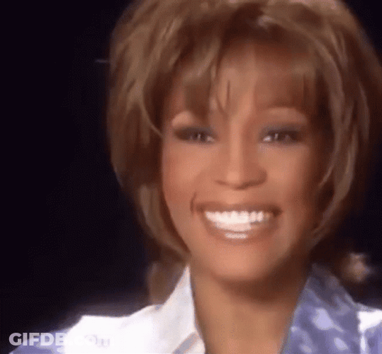 Whitney Houston Joyful Laughter Captured GIF