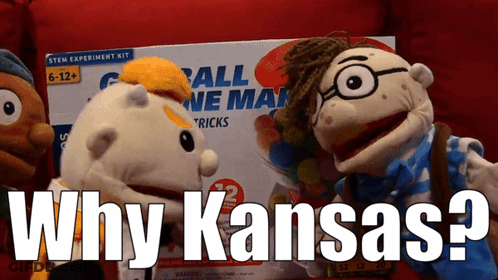 Why Kansas On Red Background Next To Puppet GIF