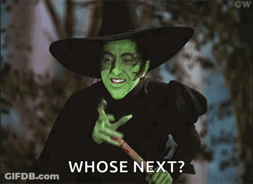 Wicked Witch From The Wizard Of Oz Holding A Bat And Asking Whose Next GIF