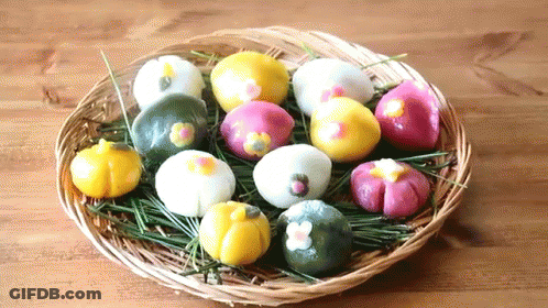 Wicker Basket Filled With Colored Balls GIF