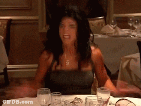 Wicker Table With Book And Number 96 GIF