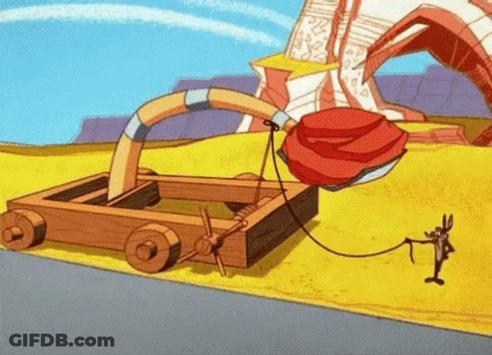 Wile E Coyote Rock Catapult Fail GIF