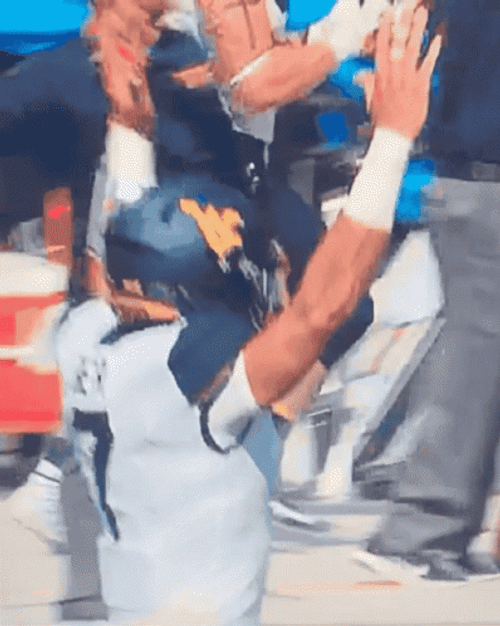 Will Grier Mountaineers Player Running Holding Up His Hands GIF