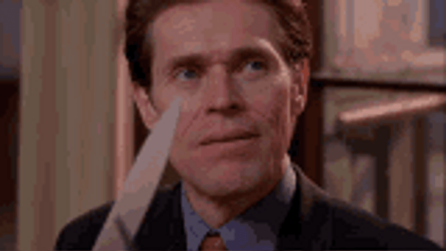 Willem Dafoe Sharpening His Knife GIF