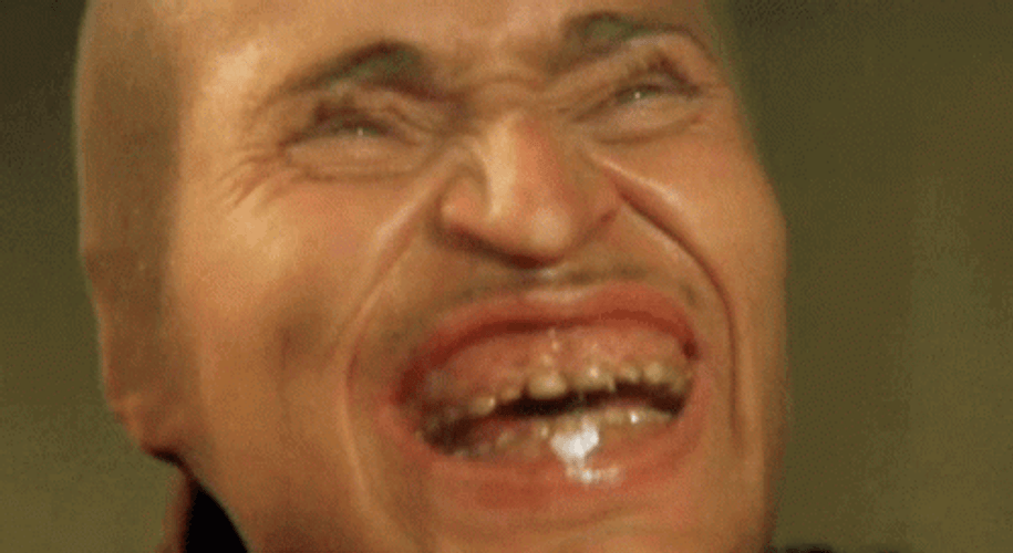 Willem Dafoe Weird Face In Foot Socks Laughing GIF