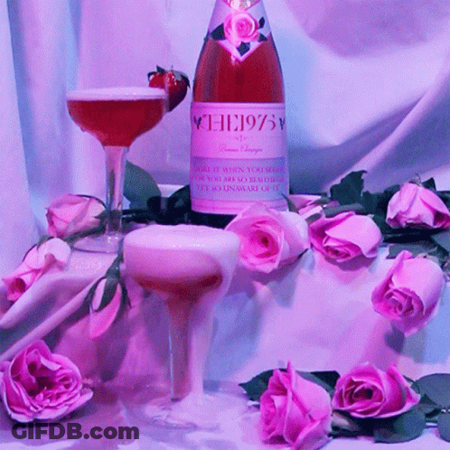 Wine Bottle 1975 Surrounded By Pink Roses GIF