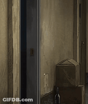 Wine Bottle On Table Next To Box In Hallway GIF