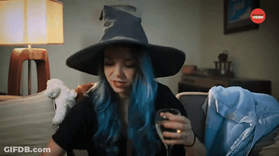 Wine Mom Wearing Sorting Hat GIF