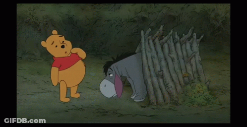 Winnie The Pooh And Eeyore Standing In Woods GIF