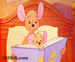 Winnie The Pooh And Piglet Reading Book On Bed GIF