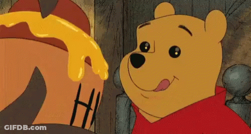 Winnie The Pooh Is Looking At A Pot Of Honey And Smiling GIF