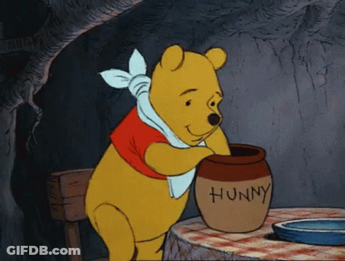 Winnie The Pooh Is Putting Honey Into A Jar That Says Hunny GIF