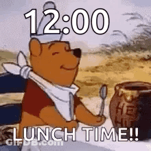 Winnie The Pooh Is Sitting At A Table With A Spoon In His Hand And A Jar Of Honey . GIF