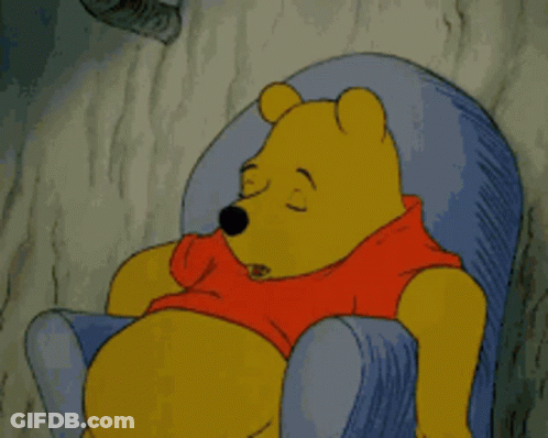 Winnie The Pooh Is Sleeping In A Chair GIF