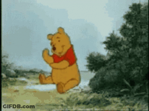 Winnie The Pooh Jumping In Air With Trees GIF
