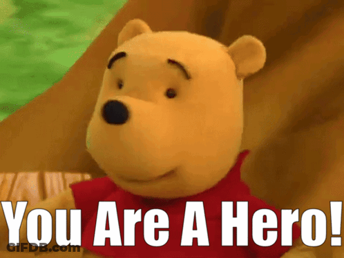 Winnie The Pooh Says " You Are A Hero " In Front Of A Green Background GIF