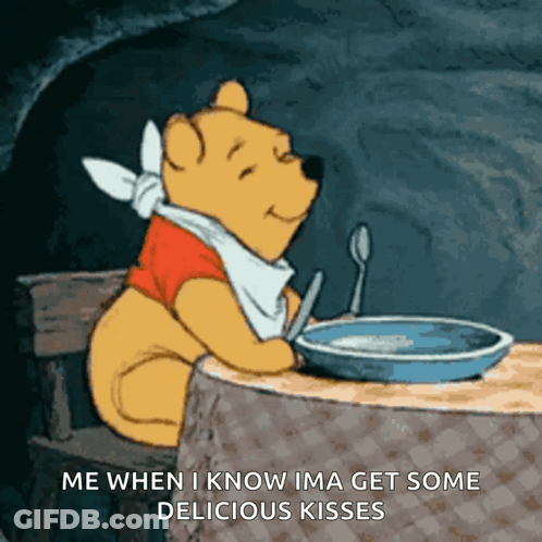 Winnie The Pooh Sitting At Table With Bowl Of Cereal And Spoon GIF