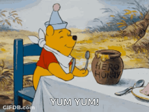 Winnie The Pooh Sitting With Honey Pot GIF