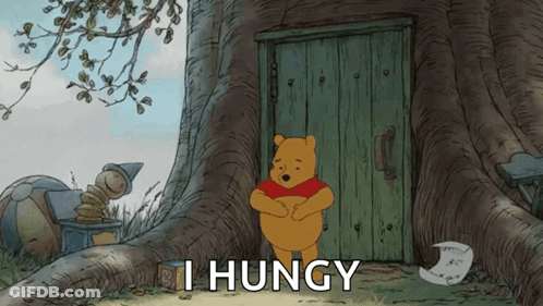 Winnie The Pooh Standing In Front Of I Huny Door GIF