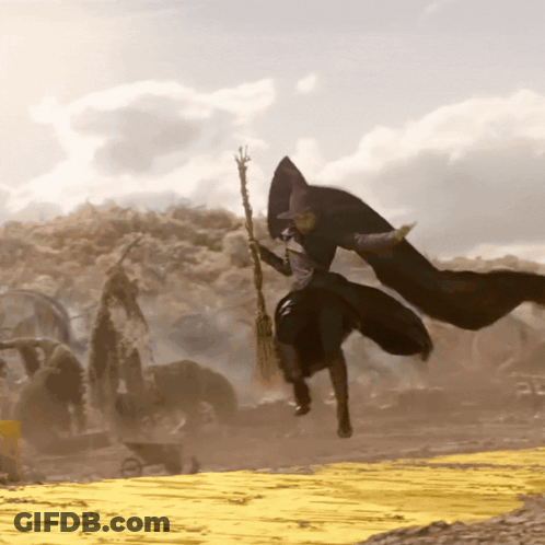 Witch Flying Over Yellow Road GIF