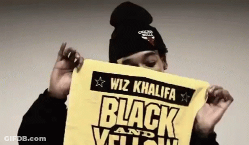 Wiz Khalifa Holding Yellow Towel Saying Black And Yellow GIF