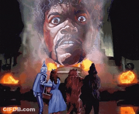 Wizard Of Oz Characters In Front Of Man's Head GIF
