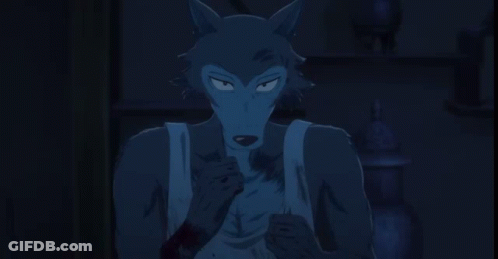 Wolf With Red Eyes Looking At Camera GIF