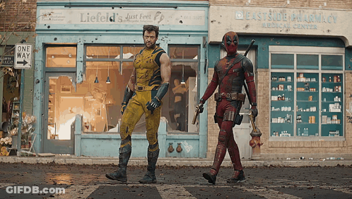 Wolverine And Deadpool In Front Of Lieffeld's Just Feet GIF