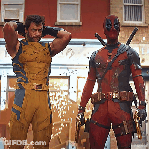 Wolverine And Deadpool Pose For Photo In Front Of Building GIF