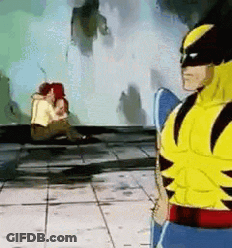 Wolverine Standing Next To Man Sitting On Ground GIF