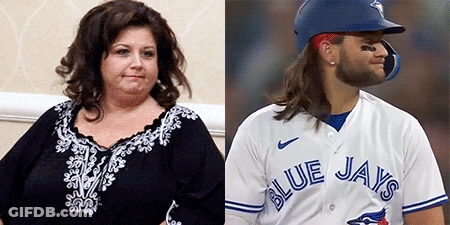 Woman And Blue Jays Baseball Player Sitting Together GIF