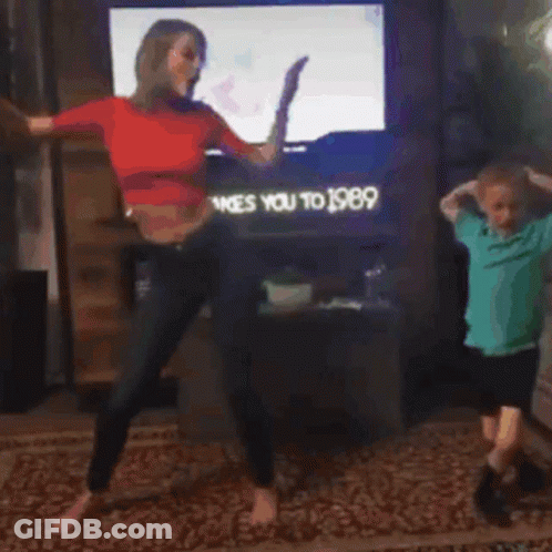Woman And Boy Dancing In Front Of TV Ty Takes You To 1989 GIF