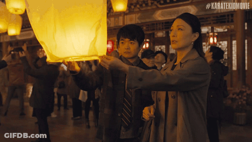 Woman And Boy Looking At Lantern #Karatekidmovie GIF
