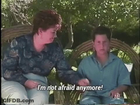 Woman And Boy On Bench Saying I'm Not Afraid Anymore GIF
