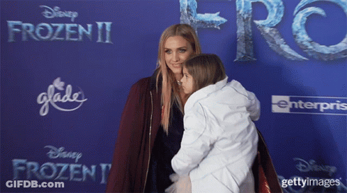 Woman And Child On Blue Frozen II Carpet GIF