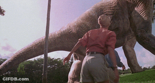 Woman And Giant Dinosaur GIF
