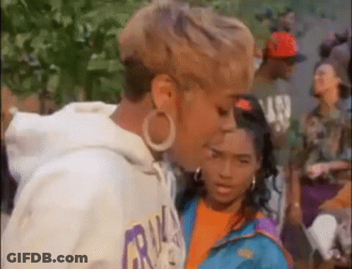Woman And Girl Standing In Front Of Crowd GIF